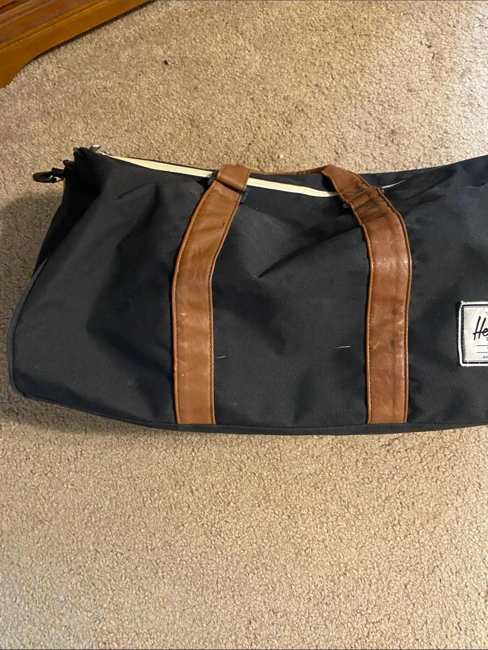 Herschel Supply Company Black Duffel with Brown Trim and Shoulder Strap